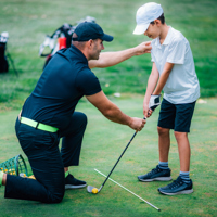 Golf Lessons Golf Instructor Giving Game Lesson Young Boy (2)
